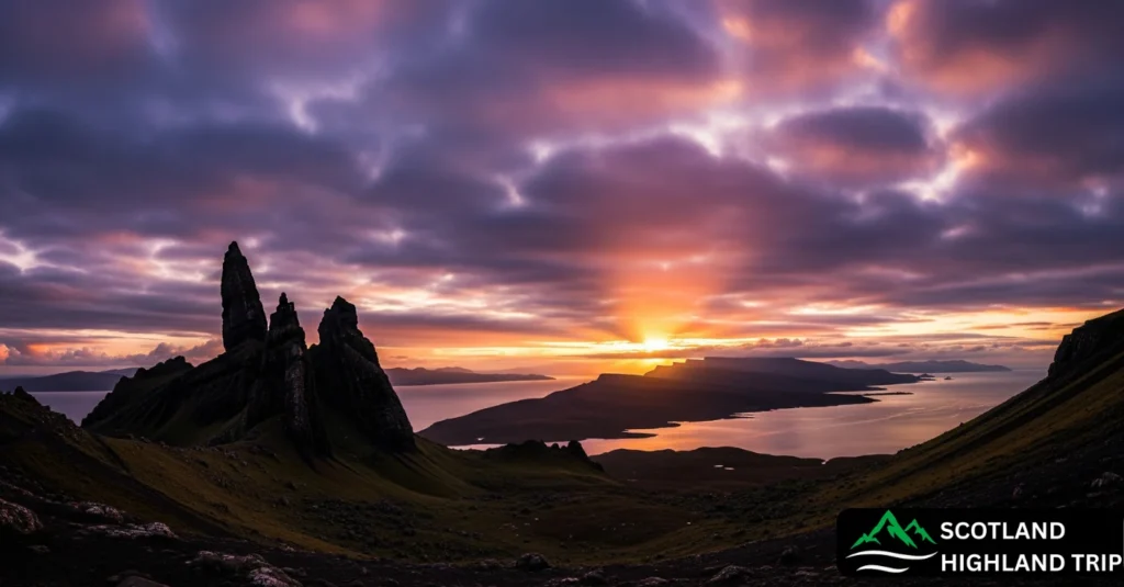 Silhouette of Old Man of Storr pinnacle against dramatic skies with sweeping views of the Sound of Raasay